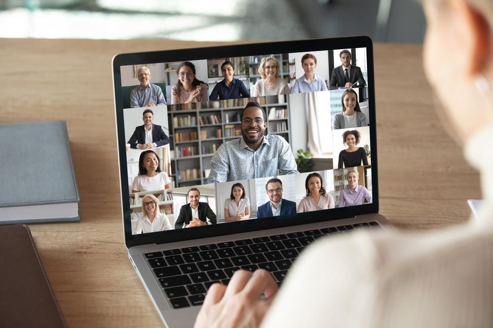 new hire on a virtual onboarding video call with team members