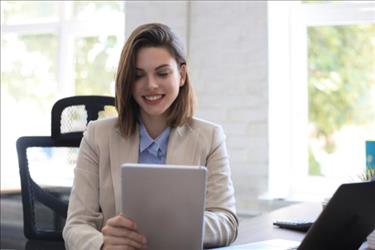 woman looking at iPad