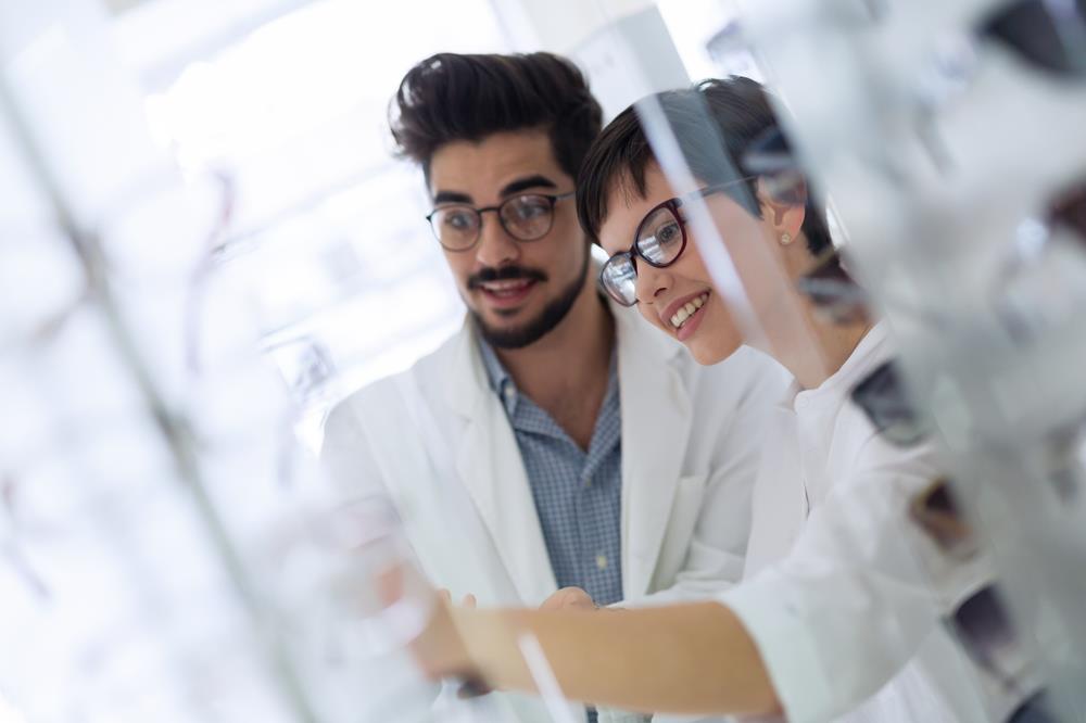 two opticians working together at their optometry practice