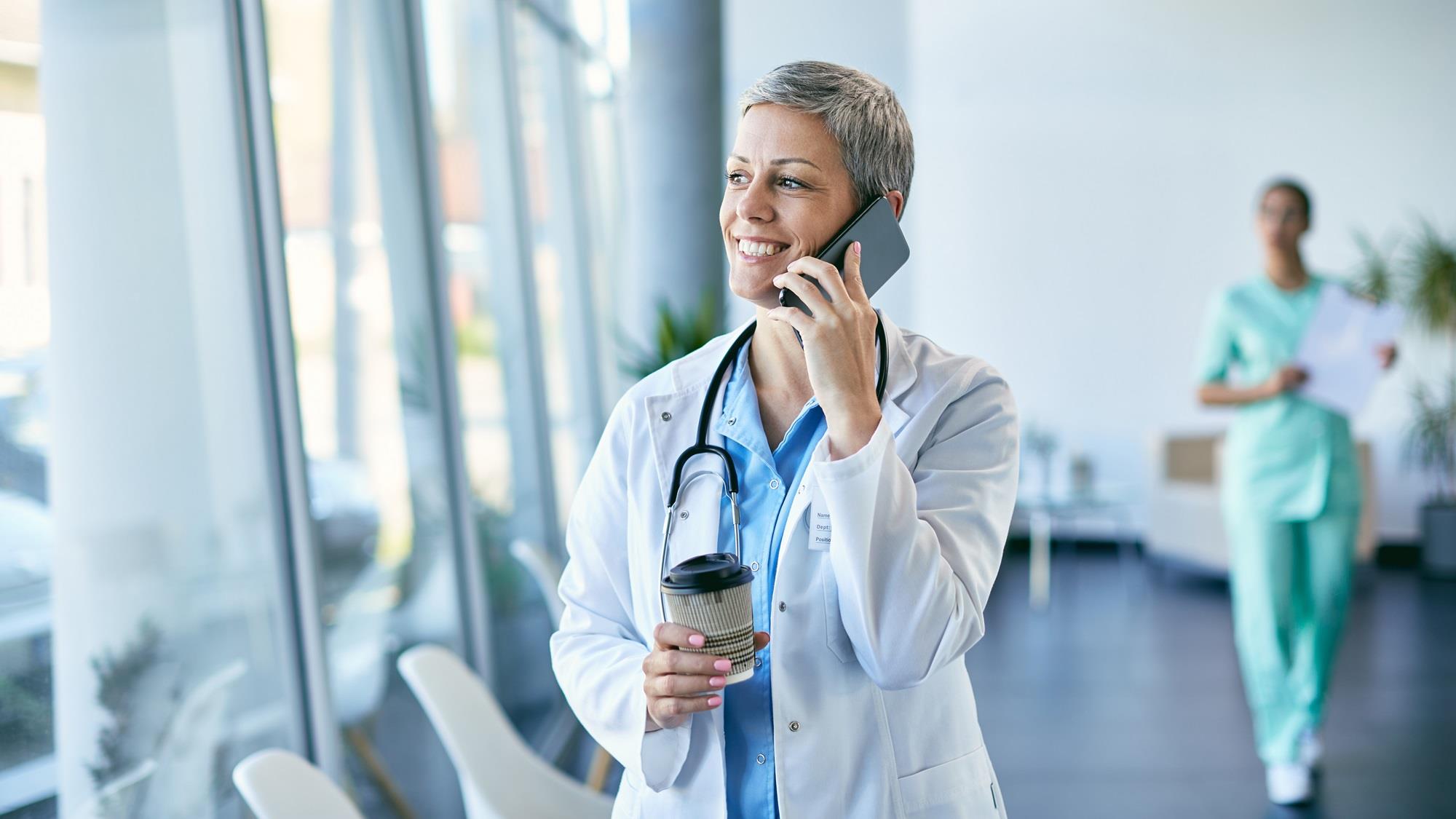 doctor on her mobile phone