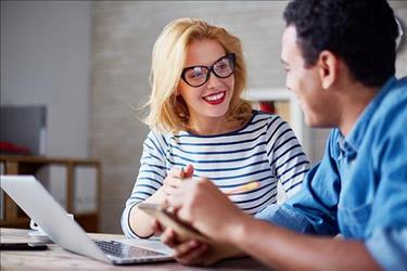 Boss and employee having a positive interaction