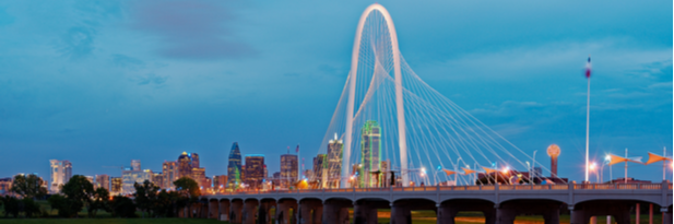 Photograph of the Dallas skyline at dusk