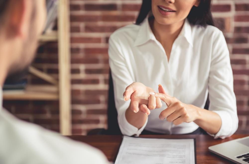 Woman explaining something during interview