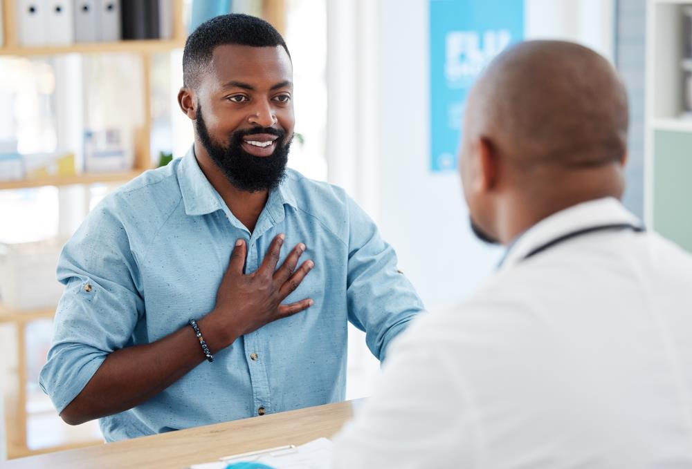 man talking to doctor