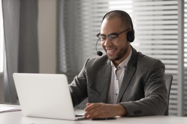 remote salesperson looking at computer