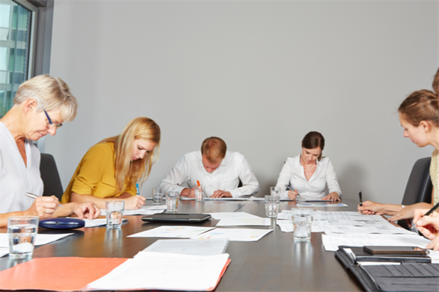 Group of applicants completing pre-employment tests