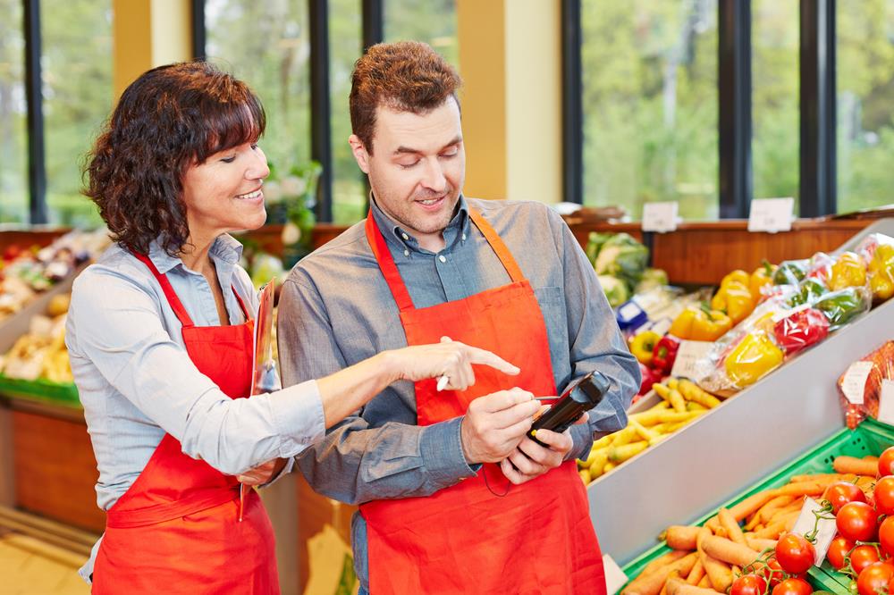 Staff supervisor helping a team member