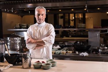 Chef standing in kitchen