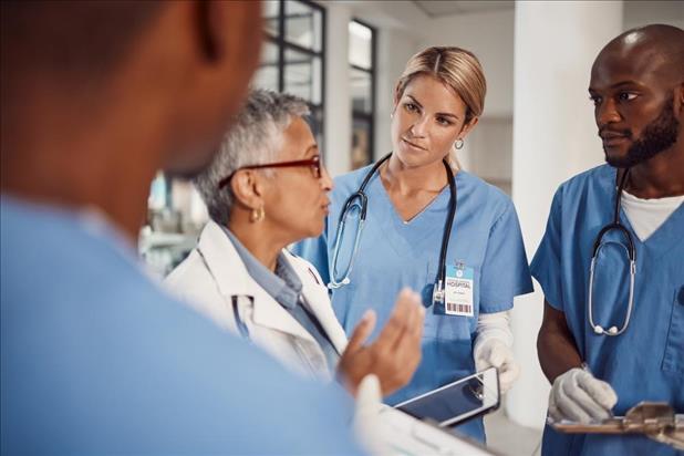 healthcare employees meeting together