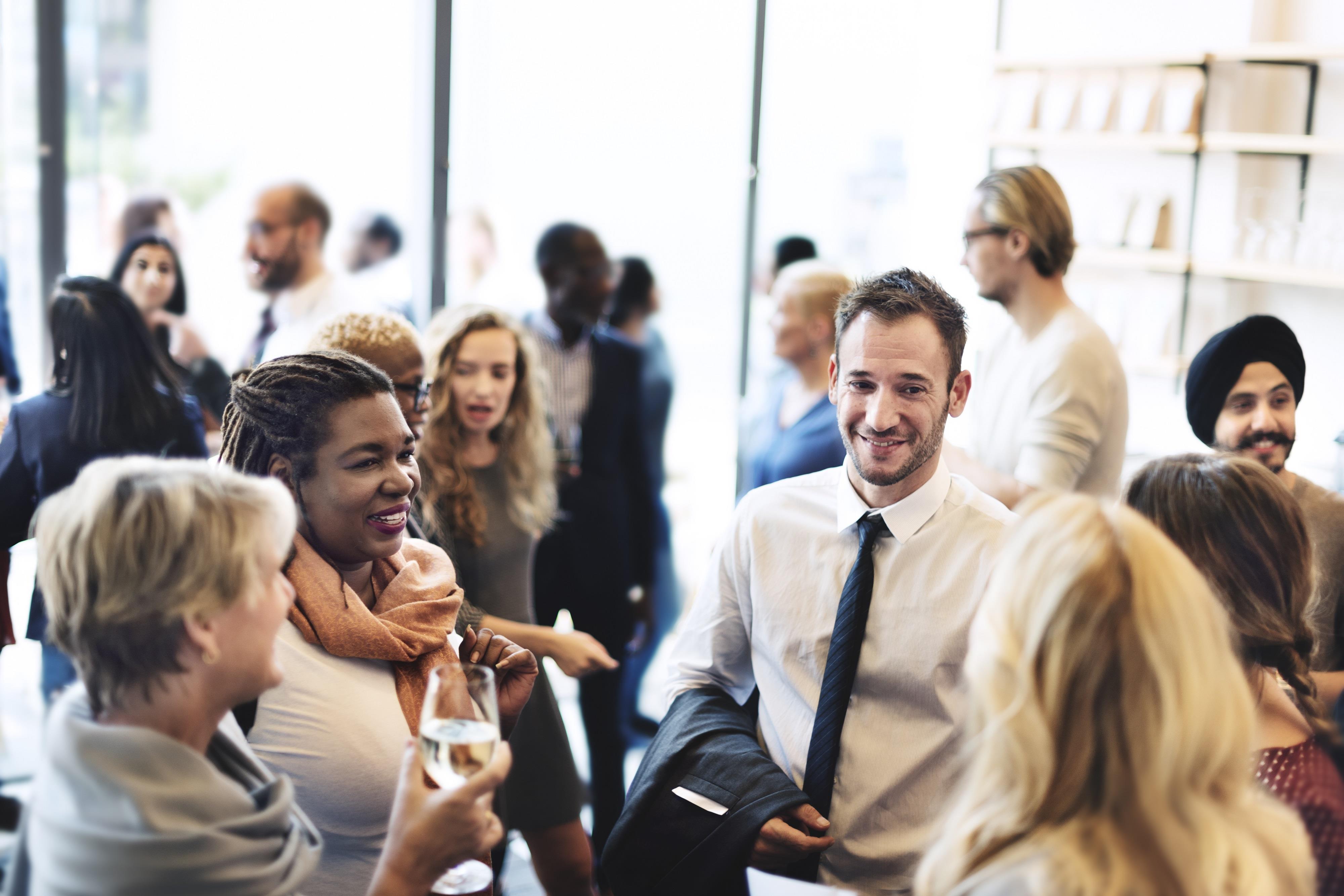 job seekers mingling at a networking event