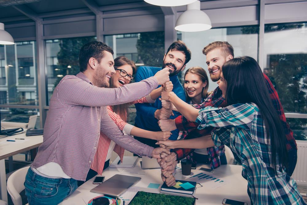 happy members of a team celebrating success