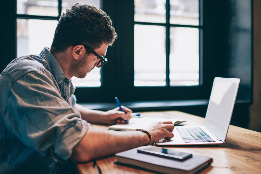 Man preparing to write salary negotiation email