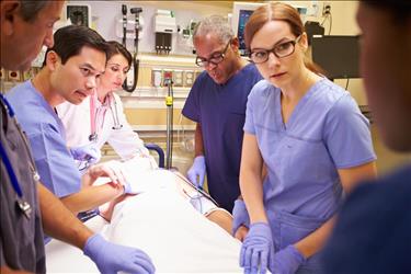 Nurses working in emergency room