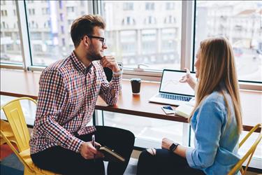 Man and woman in technical interview