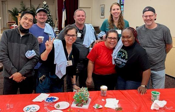 Westminster Communities of Florida team creating gingerbread houses