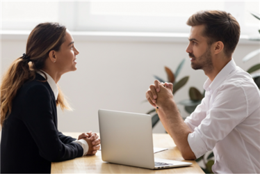 employees talking face to face