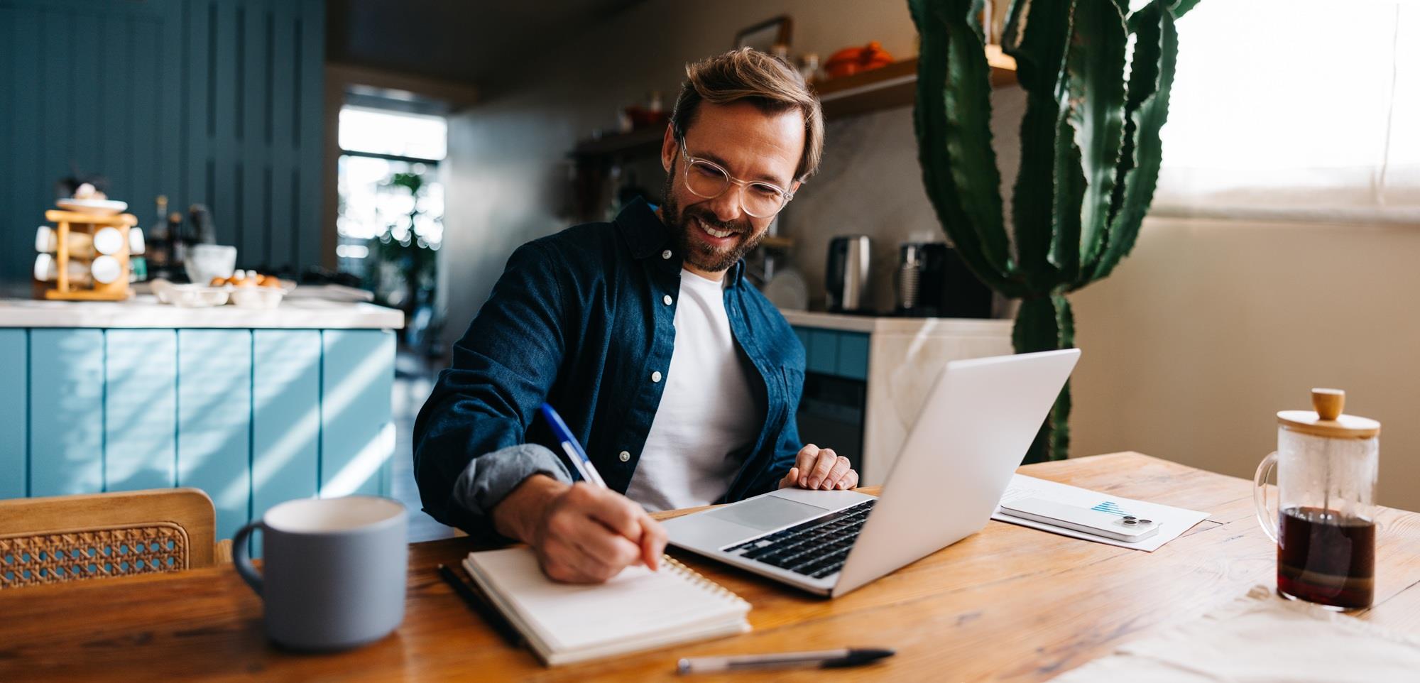freelancer smiling while working at home