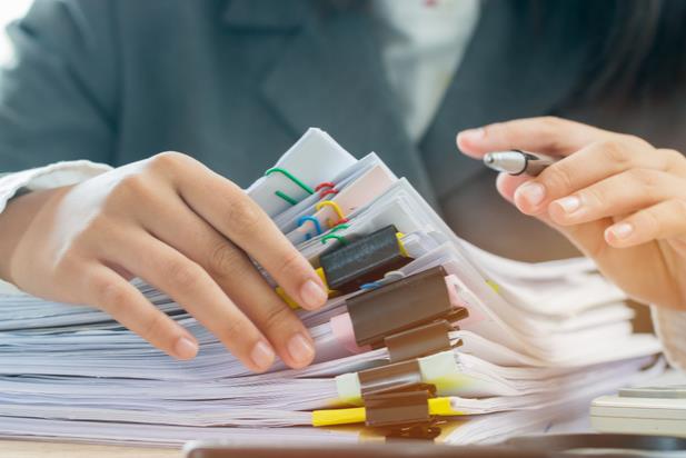 hand sorting papers