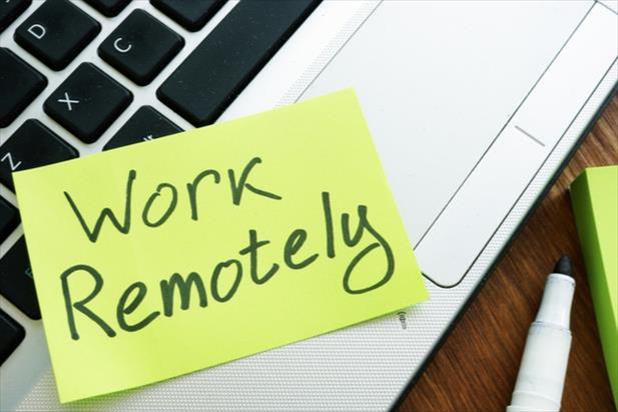 post-it note that says work remotely