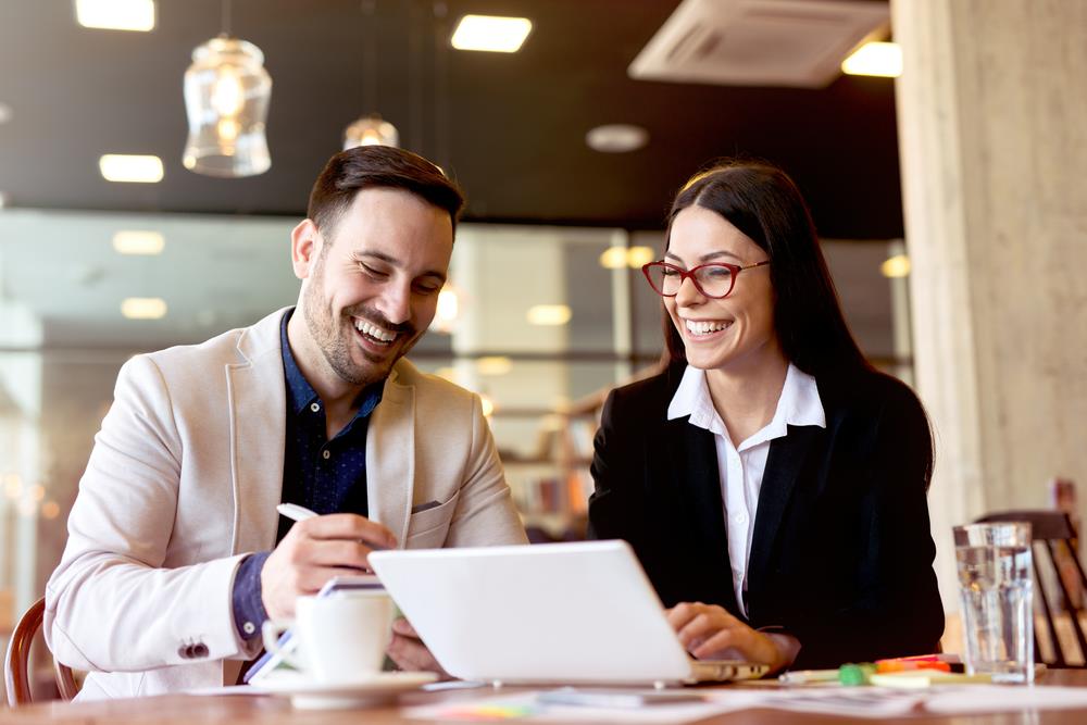 two professionals at an HR interview