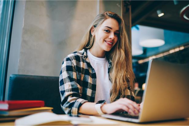 woman typing on laptop