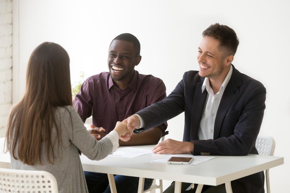 Intern Shakes Hand with Prospective Employer