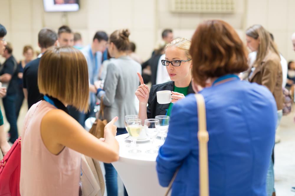 optometry professionals networking at a conference