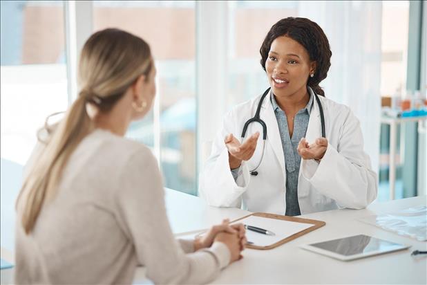 doctor speaking with a healthcare job seeker