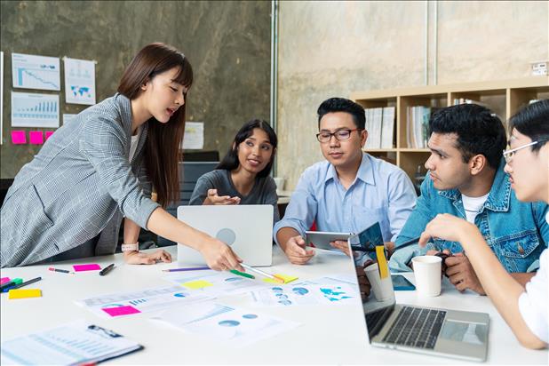 Hero Image: Team discussing a project