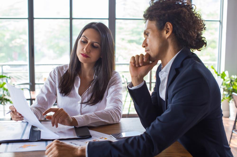 Boss having difficult conversation with employee