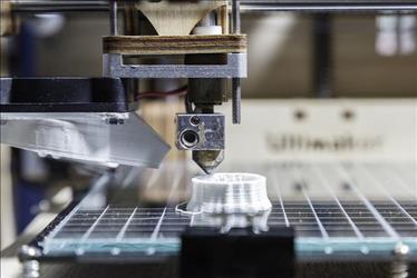 Closeup of a 3D printer in operation