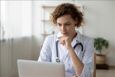 doctor working on her laptop