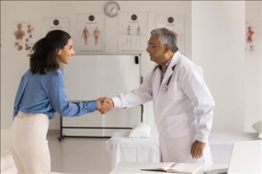 doctor shaking hands with a potential new hire