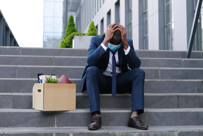 Unemployed man on steps