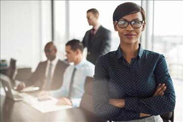 Woman in meeting with coworkers