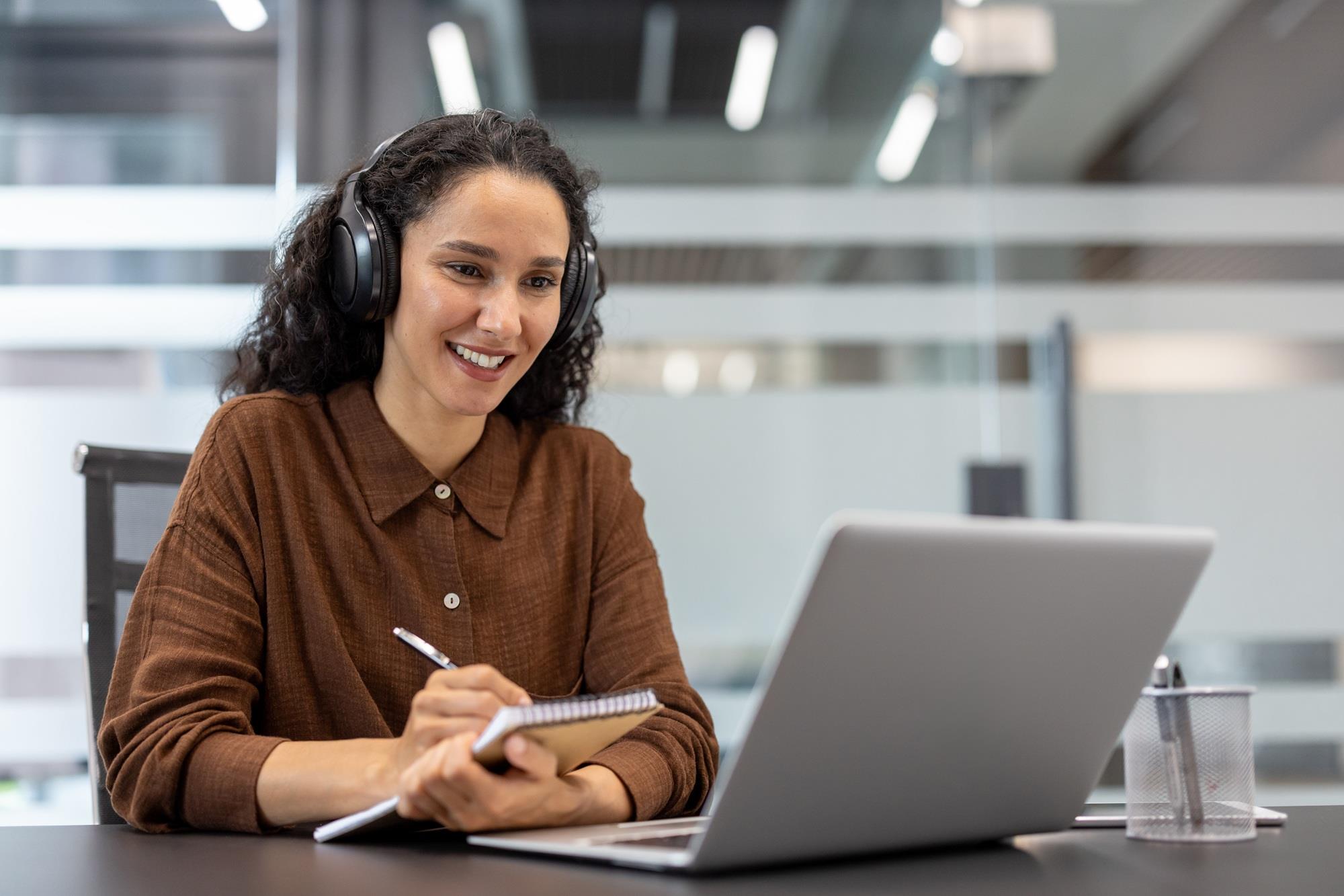 woman taking an online assessment on her laptop