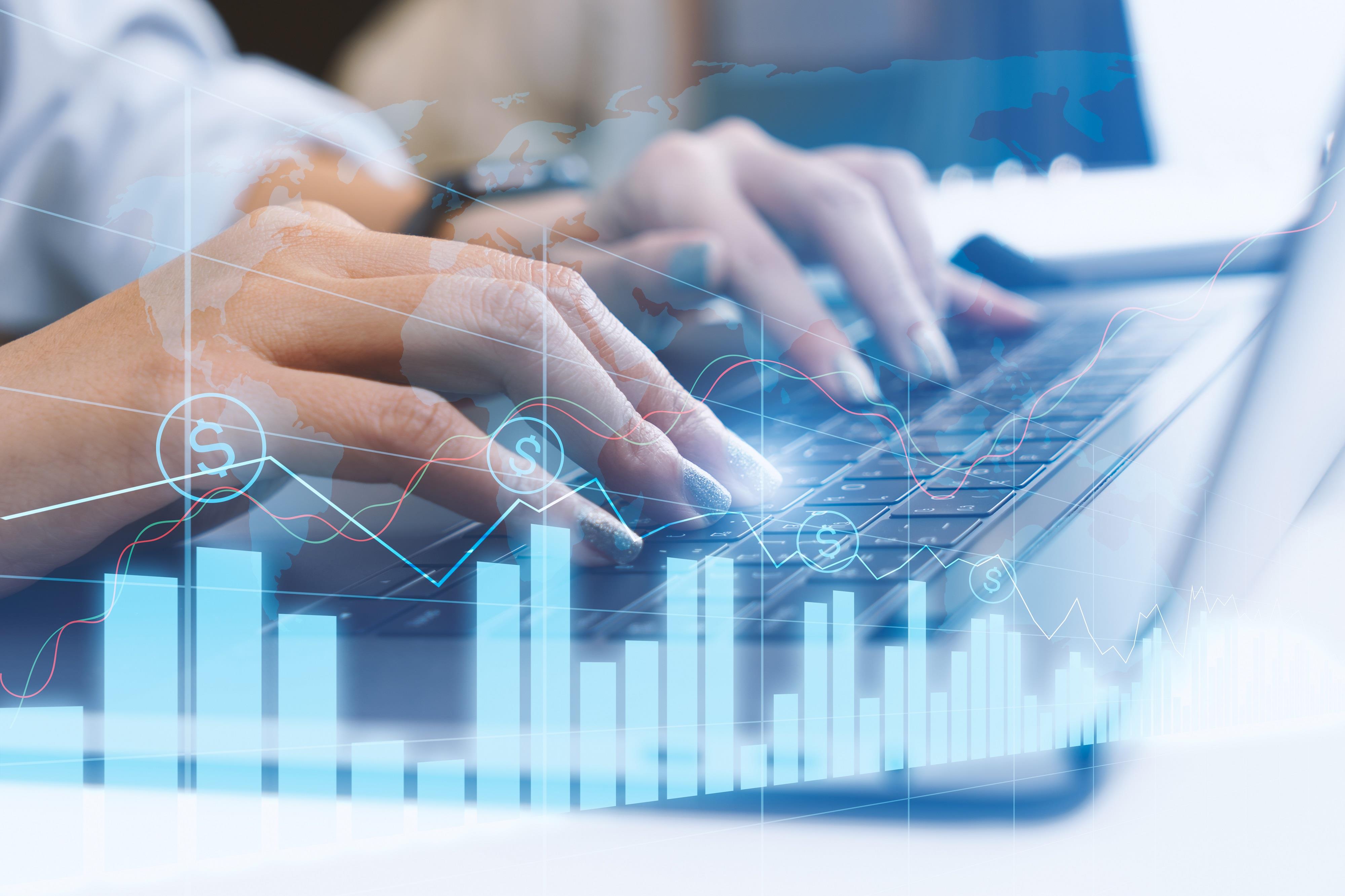 close up of a banking professional's hands on a keyboard