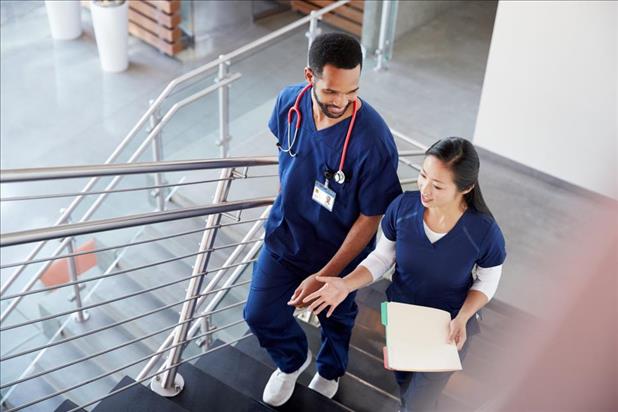 Nurse colleagues talking in hospital