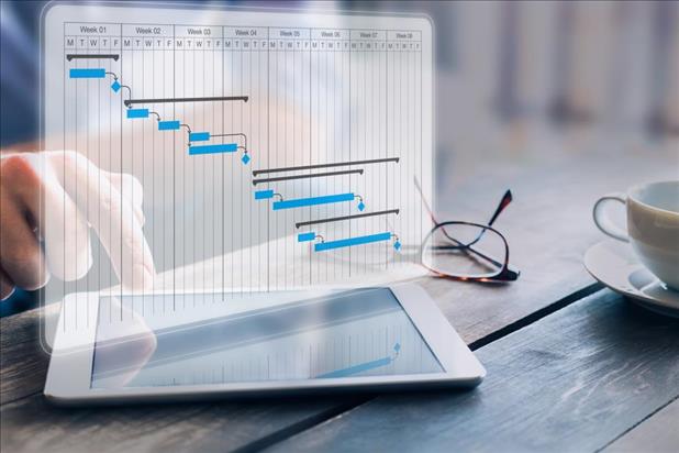 Project manager updating Gantt chart