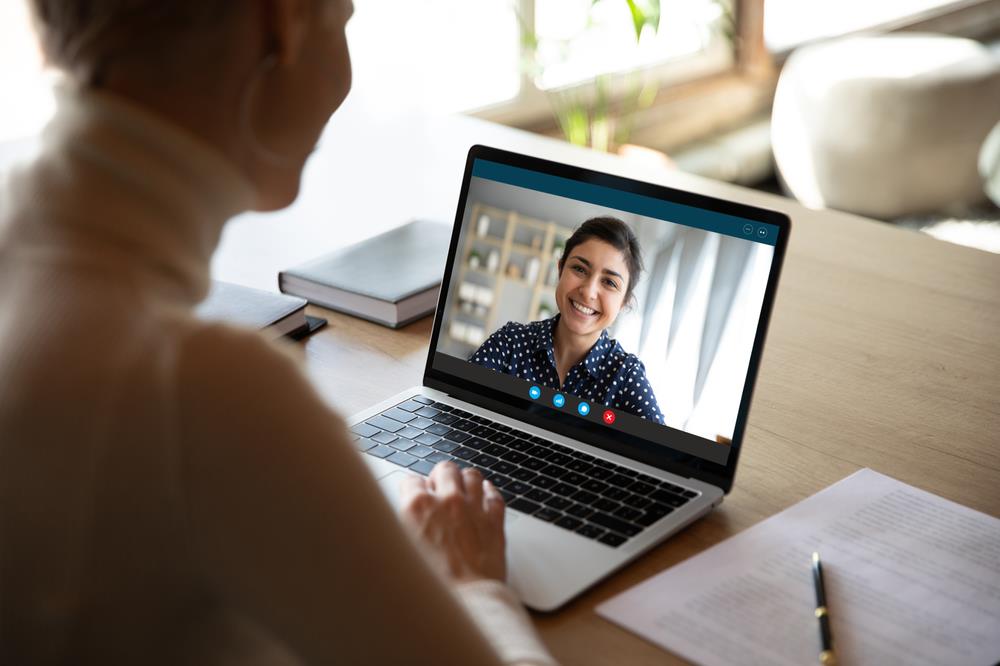 Job seeker meeting virtually with a career advisor