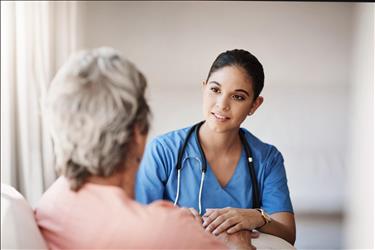 nurse providing care for a patient