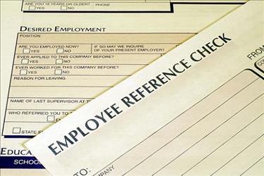 closeup of employment forms for reference check