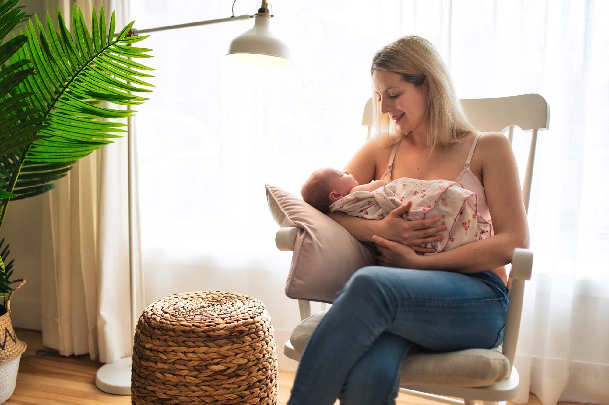 mother rocking her baby