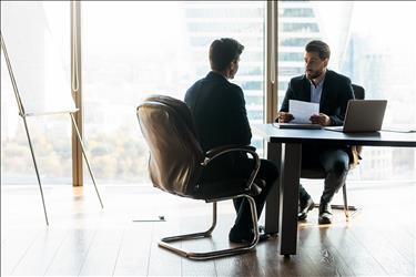 Discussion between an Employee and a Supervisor about a Performance Improvement Plan