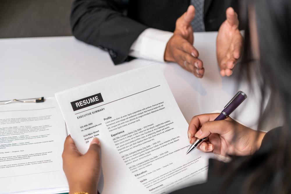 Hiring manager looking over the resume of a career changer