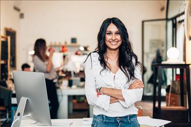 Professional happy with the strong personal brand she's created