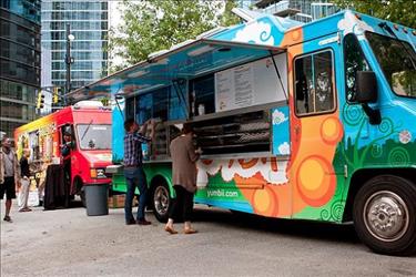 Food trucks doing business on a city street