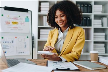 happy employee doing financial calculations