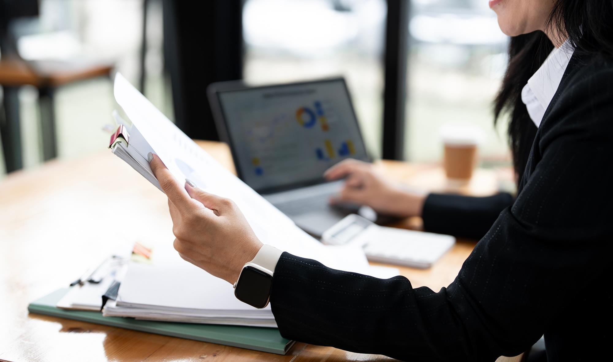 HR employee analyzing hiring costs