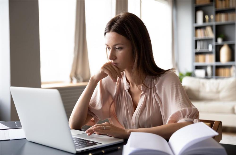 Woman asking questions on email